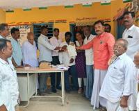 పోచారంలో స్మార్ట్ రేషన్ కార్డులు, సీఎంఆర్‌ఎఫ్ చెక్కు పంపిణీ