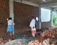 దేవాలయ భూమిలో నిర్మాణాల తొలగింపు